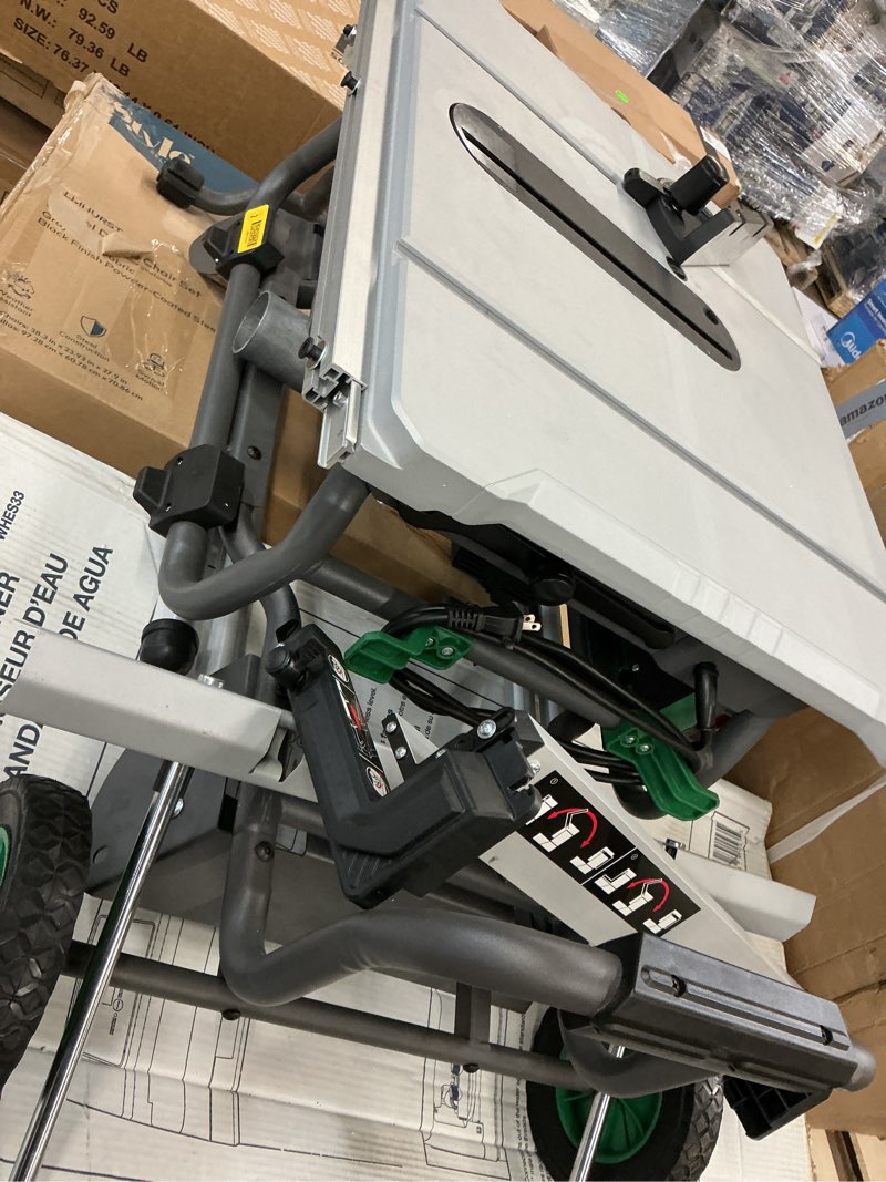 Condition photo showing As Is for metabo hpt 10" jobsite table saw with fold & roll stand