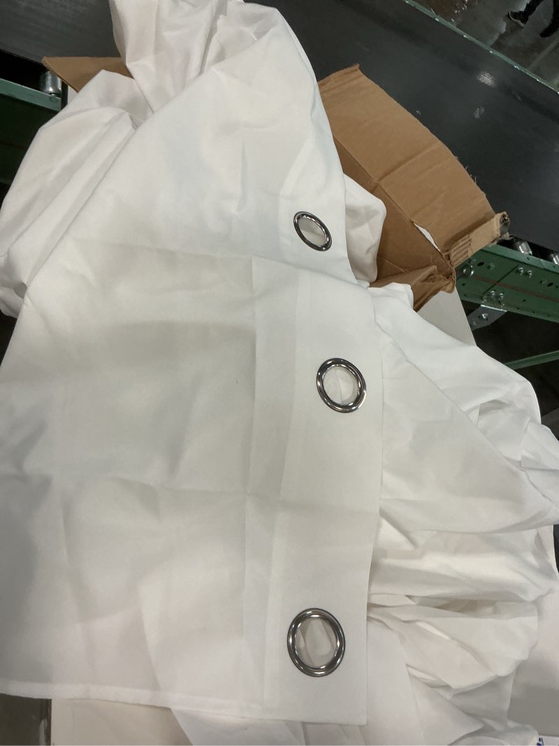 Condition photo showing Good Condition for ( similar 1 panel) Moondream LumenControl™ 100% Blackout Curtain for Bedroom | Coated Fabric | Light Block for Windows & Sliding Doors | Made in Europe | Grommet | 53\\\" W x 84\\\" L | White - Snow MC720 53\\\"W x 84\\\"L (Pack of 1) White - Snow Mc720