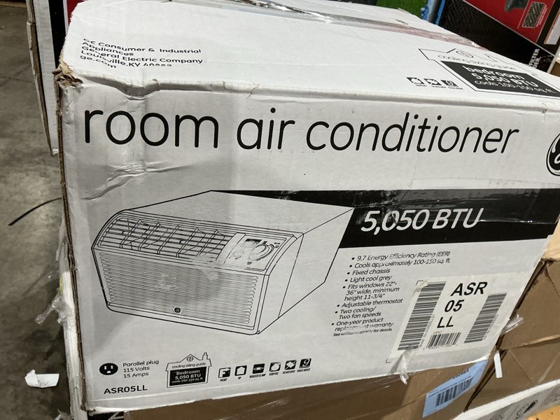 Condition photo showing As Is for room air conditioner 