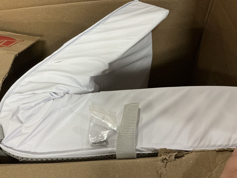 Condition photo showing As Is for Munchkin® Secure Grip™ Contoured Waterproof Baby Diaper Changing Pad, White