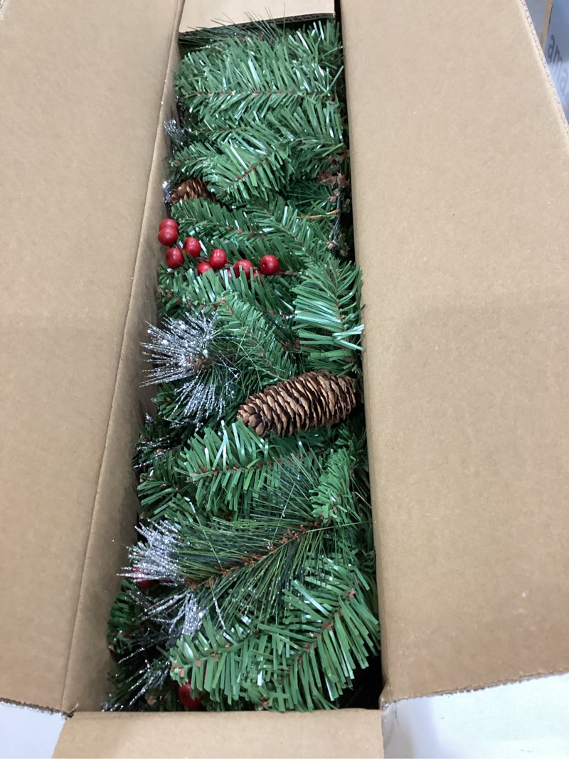 Condition photo showing Good Condition for national tree company 9 ft pre-lit crestwood spruce artificial christmas garland, christmas decoration with glitter, pinecones, red berries, 50 clear lights, 180 tips, green plug in tree