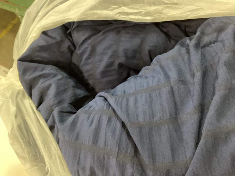 Condition photo showing As Is for AveLom Seersucker King Comforter Set (104x90 inches), 3 Pieces - 100% Soft Washed Microfiber Lightweight Comforter with 2 Pillowcases, All Season Down Alternative Comforter Set for Bedding, Navy Navy Blue King (104''x90'')