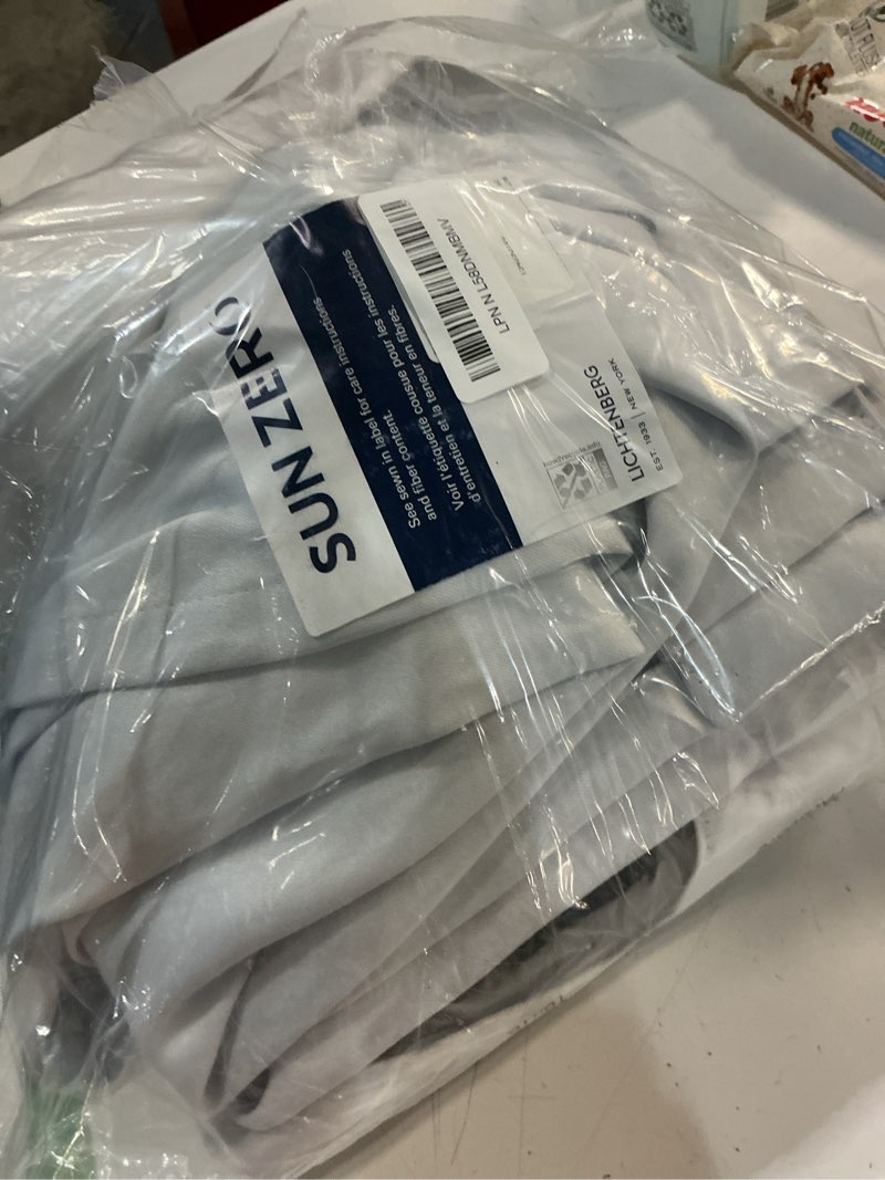 Condition photo showing Good Condition for Sun Zero Belize 2-Pack Magnetic Closure Pleated Look Theater Grade 100% Blackout Back Tab Curtain Panel Pair, 52" x 84", White White 52"W x 84"L (Pack of 2)