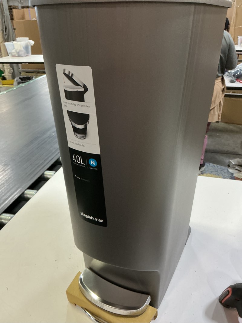 Condition photo showing As Is for missi g the lid simplehuman slim step can, 40l / 10.6 gallon kitchen trash can, stainless steel liner rim, 150,000-step pedal, lid shox® silent close, grey plastic