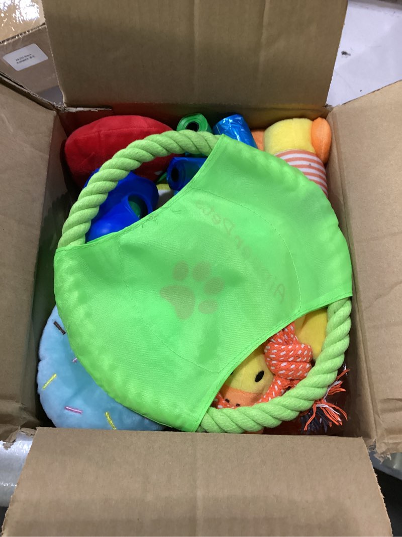Condition photo showing New/Like New for aipper dog toys 25 pack for fun and teeth cleaning, puppy chew toys pack with squeak plush toy,squeaky toy balls,tug of war and rope toys for puppy to small dogs
