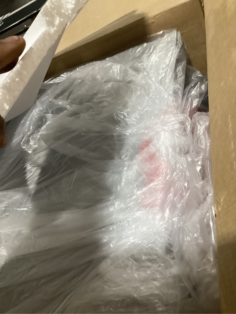 Condition photo showing As Is for Farberware 1.6 Cu. Ft. Countertop Microwave Oven – 1100 Watts Power, Smart Sensor Auto Cook Settings, Defrost, Easy Clean and Child Safety Lock - Stainless 1.6 Cu. Ft. Stainless Steel