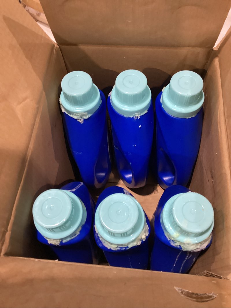 Condition photo showing As Is for *product around the cap* Clorox Fraganzia Liquid Laundry Detergent in Ocean Scent - HE Compatible for All Front and Top Load Washing Machines, High Efficiency Laundry Detergent Compatible, 40 Fl Oz - 6 Pack Ocean 40 Fl Oz (Pack of 6)