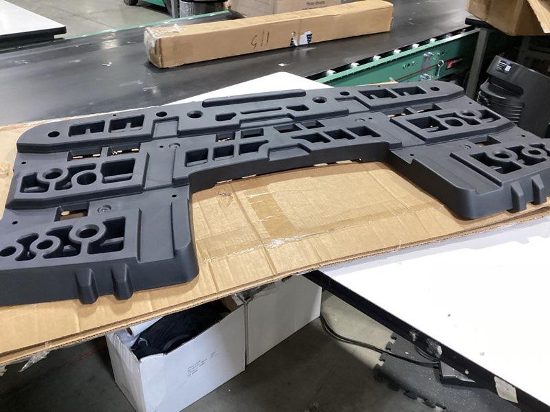 Black rear rack assembly. Vehicle unknown.