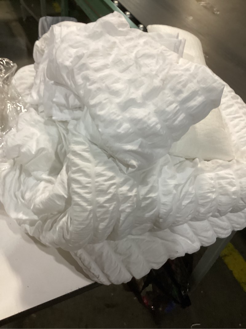 Condition photo showing As Is for CozyLux King Size Comforter Set White Seersucker 7 Pieces Bed in a Bag King Comforter Set with Sheets, Luxury Soft Bedding Set with Down Alternative Comforter, Sheets, Pillowcases & Shams All Seasons White King (missing pieces)