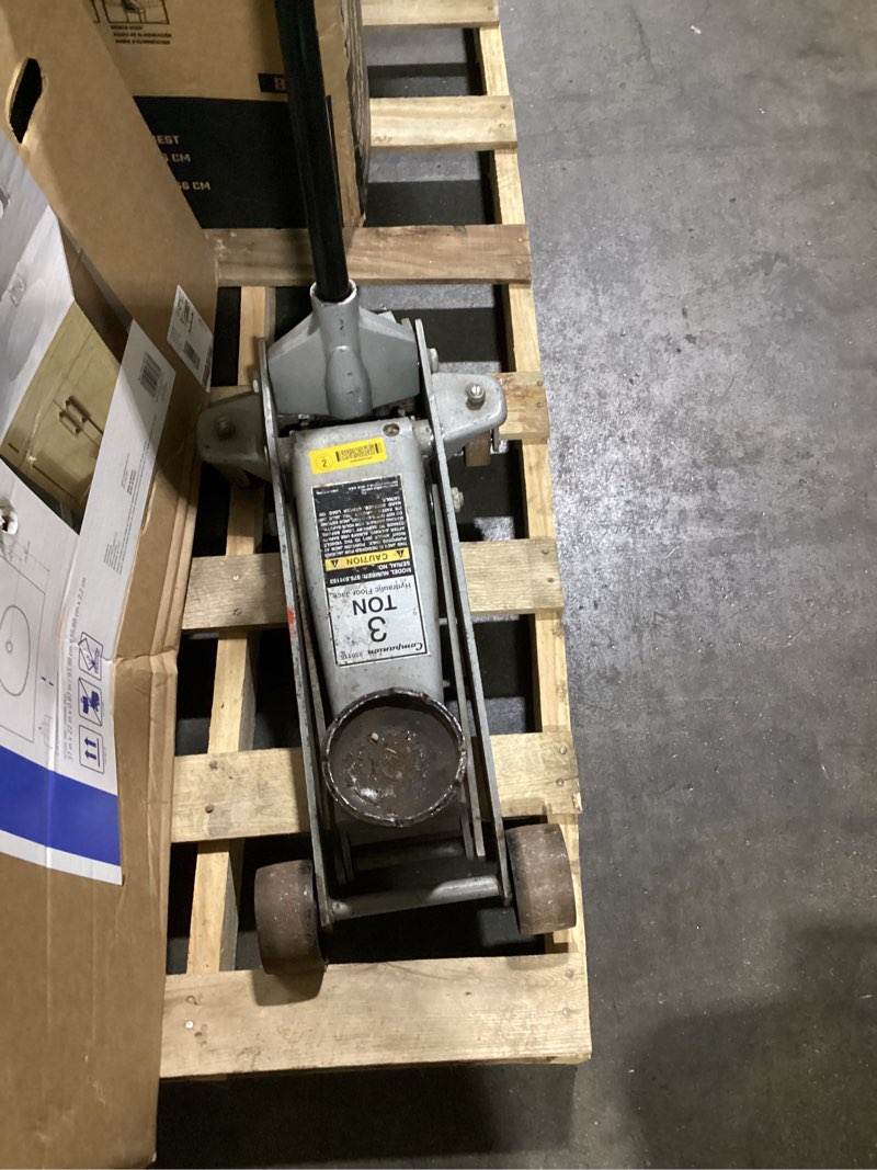 Condition photo showing As Is for 3 ton floor jack grey.