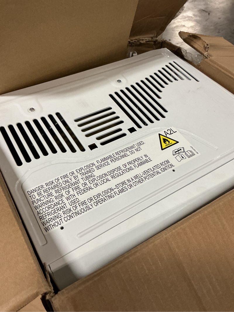 Condition photo showing As Is for ge window air conditioner unit, 5,000 btu for small rooms up to 150 sq ft. with manual adjustable fan and cooling settings, perfect for small bedroom or living room, easy install kit included, white new 5,000 btu mechanical controls white