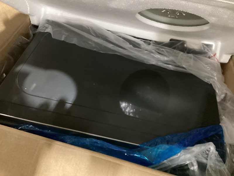 Condition photo showing Good Condition for 0.7 cu. ft. 700-watt spacemaker countertop microwave in stainless steel