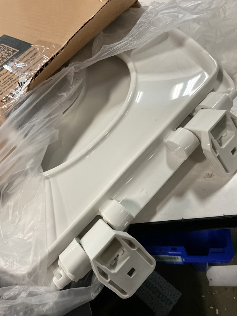 Condition photo showing As Is for mayfair little2big? elongated plastic toilet seat in white with sta-tite? seat fastening system? and whisper•close? hinge