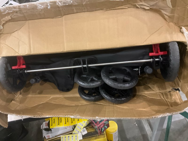 Condition photo showing As Is for Kolcraft Cloud Plus Lightweight Double Stroller Side-by-Side for Infant Toddler, Compact Folding Travel System with Reclining Seats, Canopies, Storage Basket, Trays, Easy Maneuver – Red Black