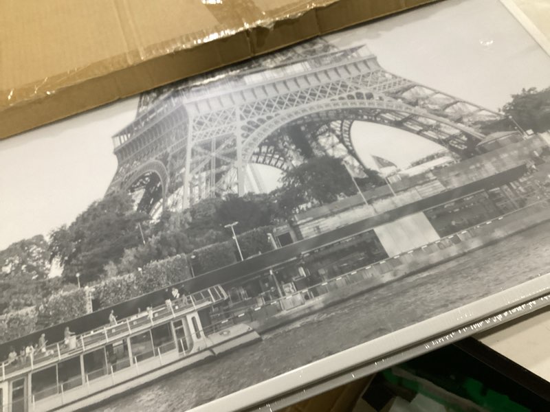 Condition photo showing Good Condition for americanflat 24x36 poster frame in black - set of 3 - 24x36 frame with slimline molding, plexiglass cover, and hanging hardware for horizontal or vertical wall display