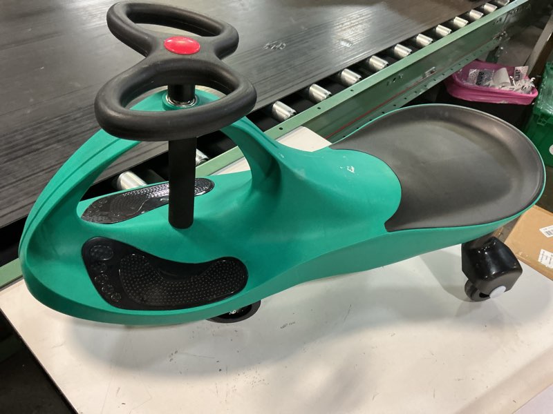 Condition photo showing Good Condition for wiggle car ride on toy - no batteries, gears or pedals - twist, swivel, go - outdoor ride ons for kids 3 years and up by lil' rider (green) green and black