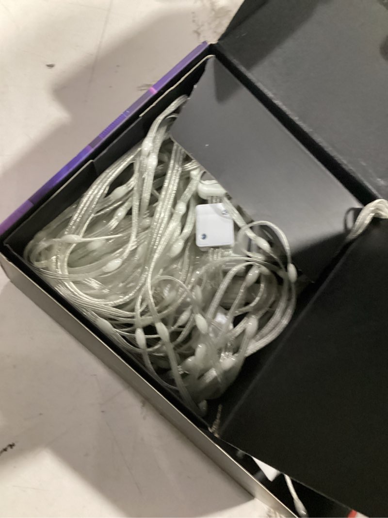 Condition photo showing As Is for govee netflix rgbic indoor curtain lights 4.92x4.92ft with 400 led leads