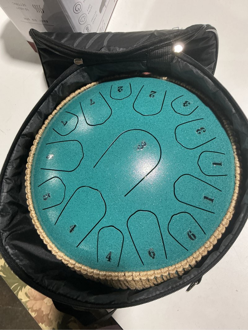 Condition photo showing Good Condition for Steel Tongue Drum - 13 Inches 15 Notes Tongue Drum - Hand Pan Drum with Music Book, Handpan Drums Mallets and Carry Bag, D Major (Malachite Green) 13 Inch 15 Note Malachite Green