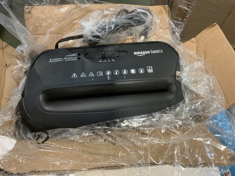 Condition photo showing As Is for Amazon Basics 8-Sheet Cross Cut Paper Shredder and Credit Card Shredder - Black 8 Sheet Black