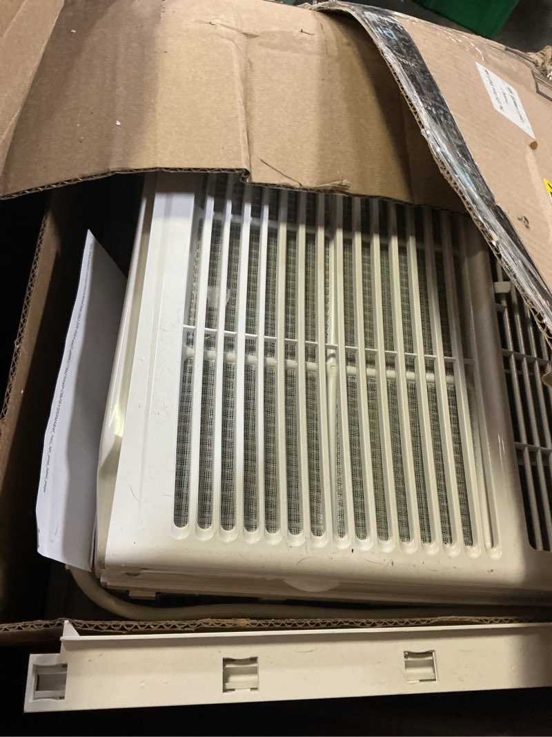 Condition photo showing As Is for amazon basics 5000-btu window air conditioner with quiet operation, up to 150 sqf, cool and fan functions, washable filter, adjustable window kit, intuitive mechanical controls, for small room, white white 5000 btu