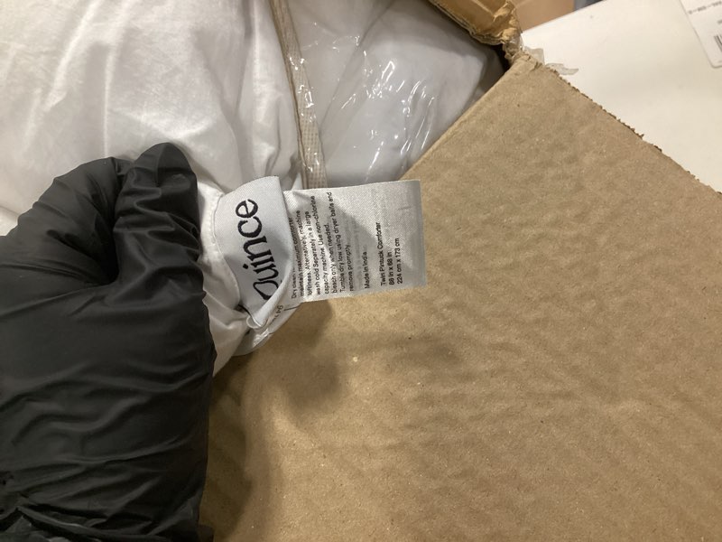 Condition photo showing As Is for cotton pintuck comforter, twin, white