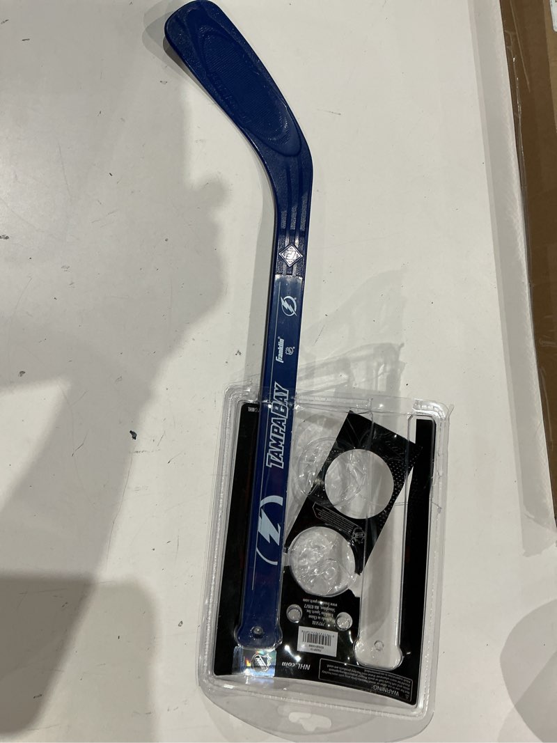 Condition photo showing As Is for franklin sports nhl mini hockey stick set - nhl team knee hockey stick and ball set - two player stick set - great toy for kids tampa bay lightning