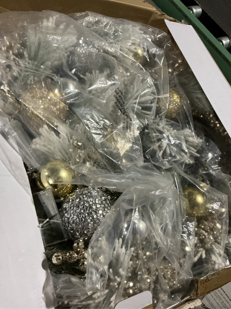 Condition photo showing Good Condition for 24" lighted christmas wreath with led lights, ornaments, and flowers