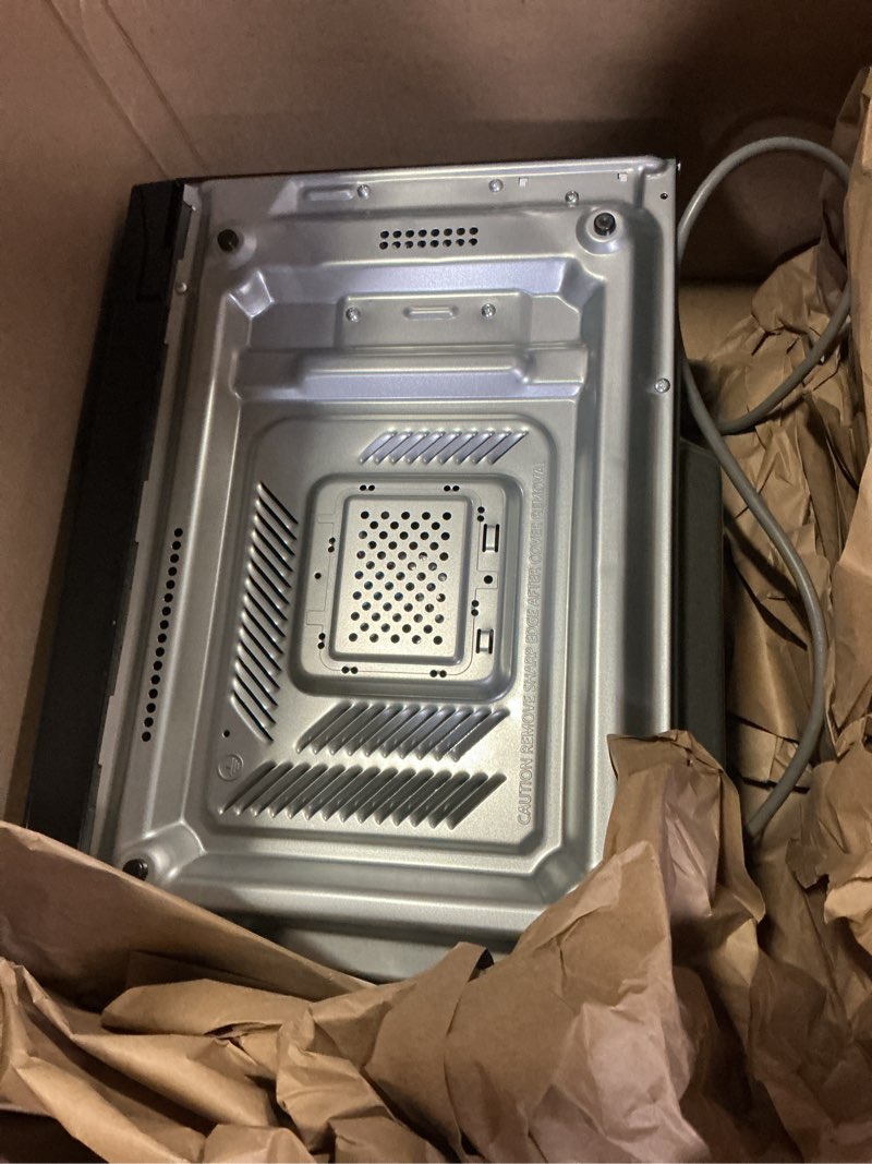 Condition photo showing As Is for lg countertop microwave, 1.1 cu. ft., black, 20.1x11.4x15.7 inches, easyclean interior, 900 watts
