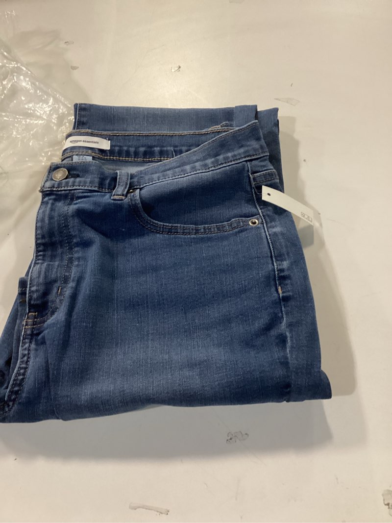 Condition photo showing Good Condition for Amazon Essentials Women's Women's High Stretch Slim-Fit Mid-Rise Bootcut Jean, Classic Medium Wash, 