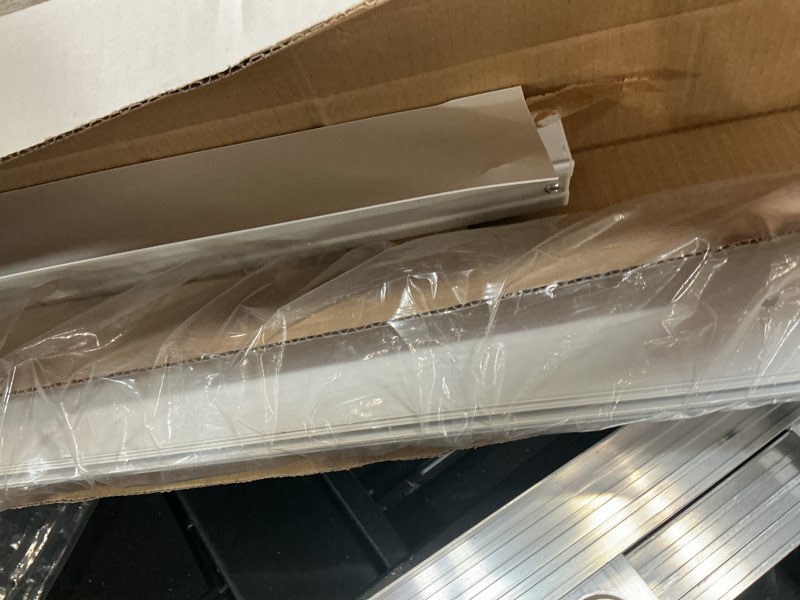 Condition photo showing As Is for project source 3.5-in slat width 66-in x 84-in cordless white vinyl room darkening vertical blinds
