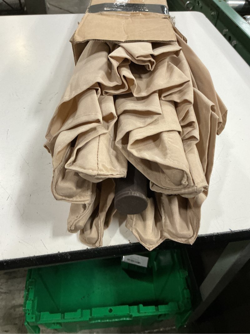 Condition photo showing Good Condition for jearey 9ft outdoor patio umbrella outdoor table umbrella with push button tilt and crank, market umbrella 8 sturdy ribs uv protection waterproof for garden, deck, backyard, pool (beige)