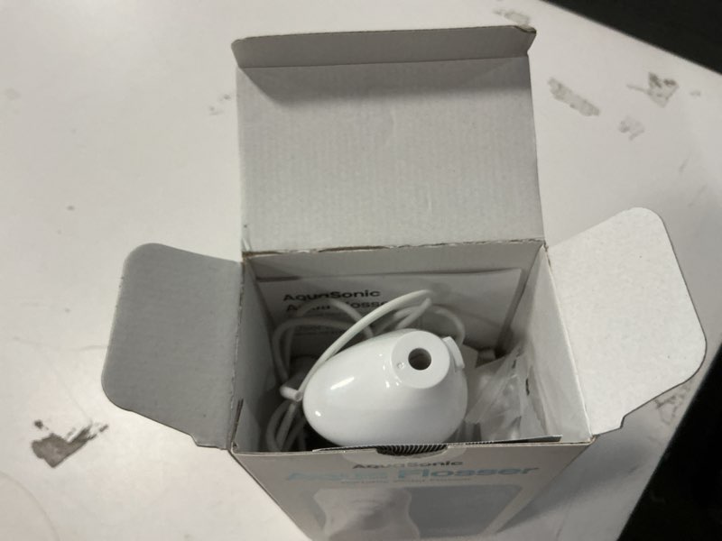 Condition photo showing As Is for AquaSonic Water Flosser - Cordless Rechargeable Water Flossers for Teeth Cleaning - Waterproof Aqua Flosser, Portable Oral Irrigator for Dental Cleaning with 5 Jet Tips – Braces Home Travel. White