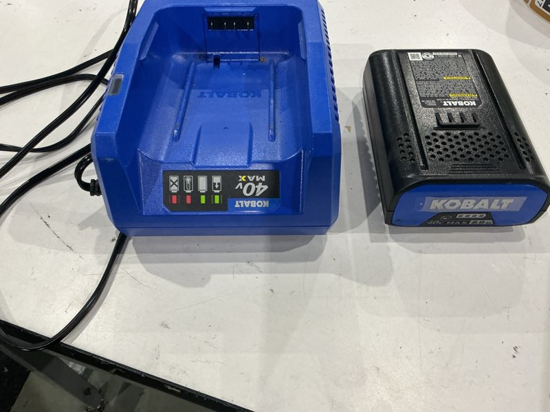 Condition photo showing As Is for kobalt 40v max 4.0 ah extended run battery + charger kit fast charging