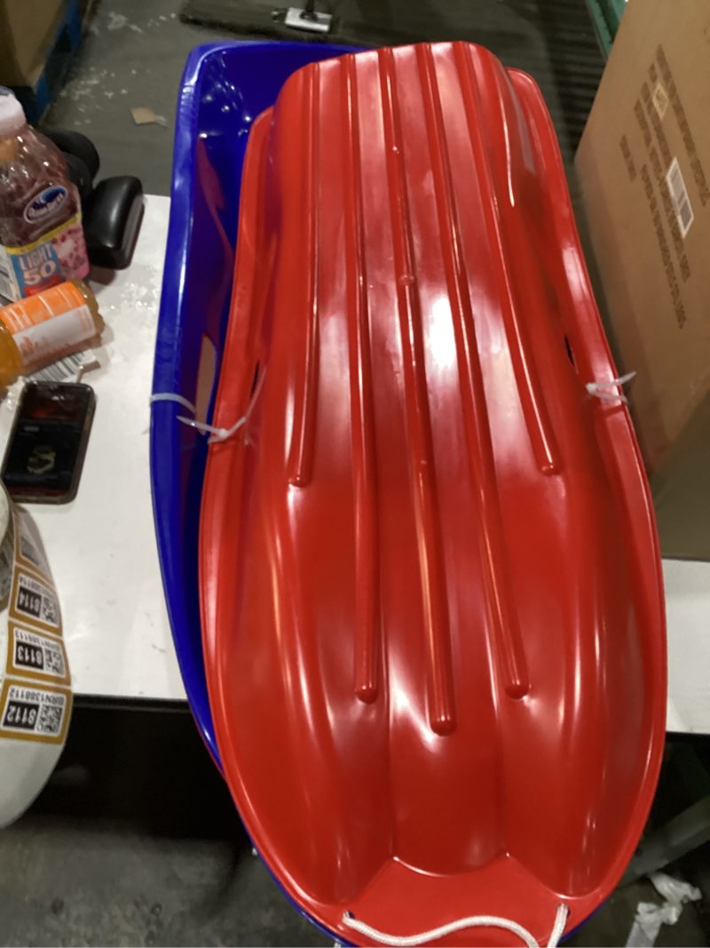 Condition photo showing Good Condition for Kid sleds 1 red 1 blue 