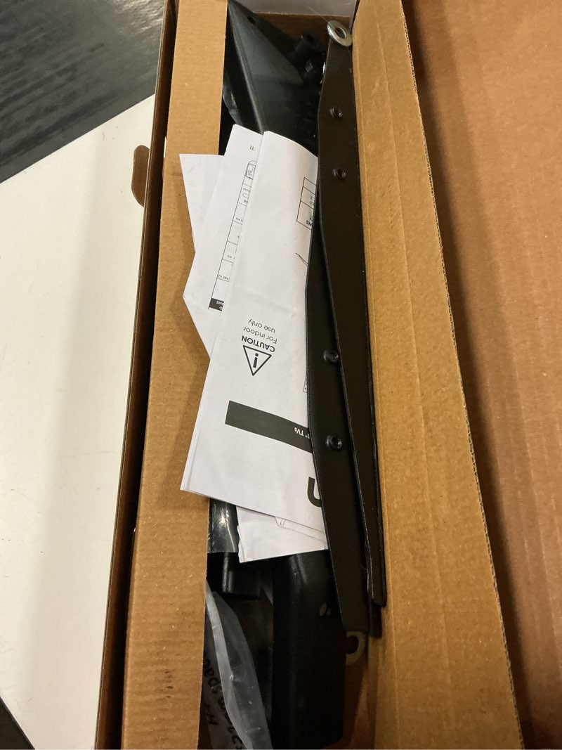 Condition photo showing As Is for onn tabletop tv stand for 37" to 70" tvs, holds up to 110 lbs, black- metal legs for tabletop