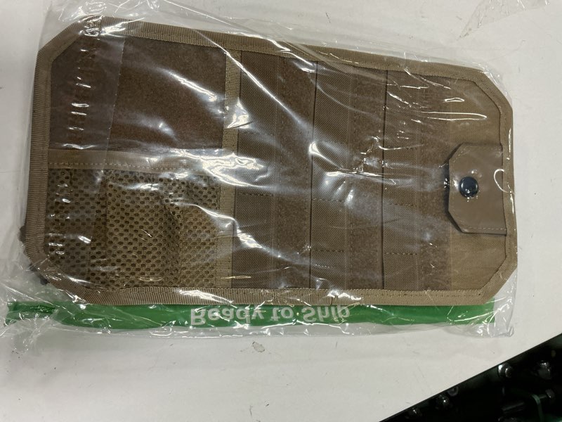 Condition photo showing New/Like New for wynex molle car sun visor organizer, car accessories with zip storage pouch & glasses holder, semi-rigid molle panel with patch for tactical gears, fits most cars, trucks, pickups, patrols khaki