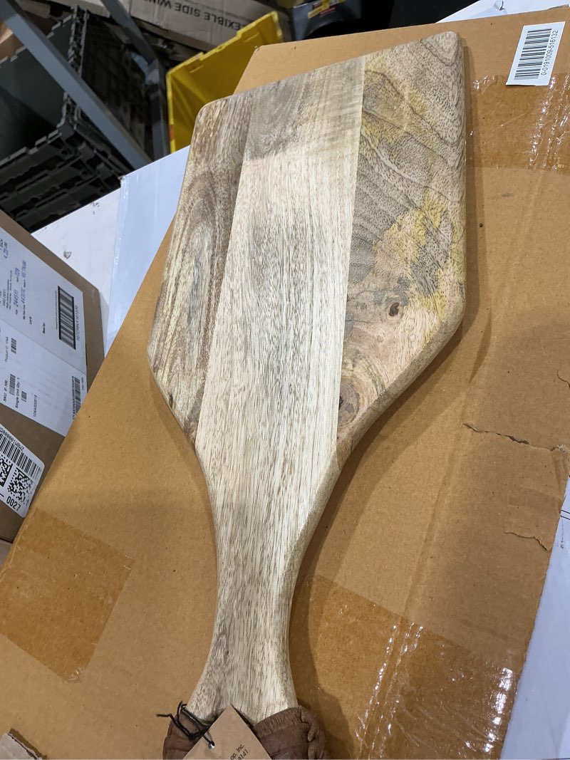 Condition photo showing As Is for creative co-op mango wood cutting board with braided leather handle, 19''l x 8''w
