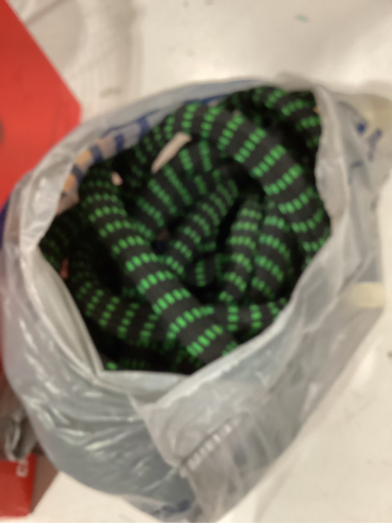 Condition photo showing Good Condition for black and green stretch hose