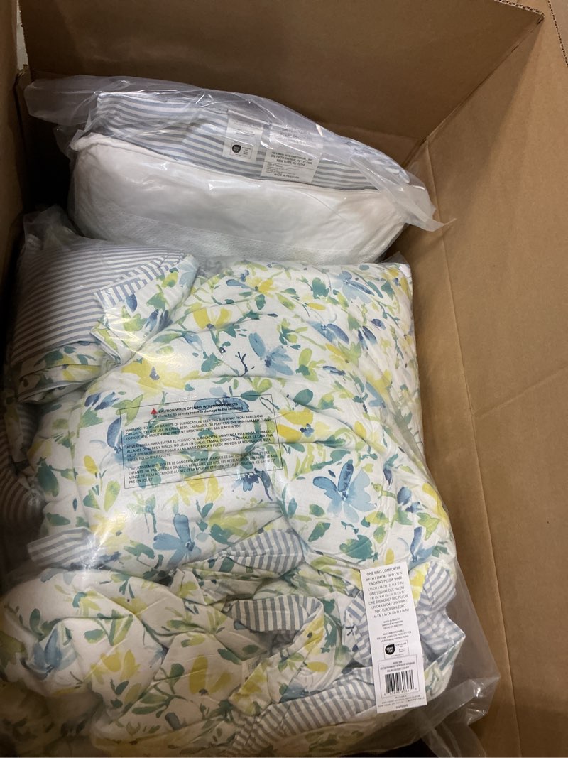 Condition photo showing New/Like New for Laura Ashley - King Comforter, Soft Reversible Bedding Set, Includes Matching Shams with Bonus Euro Shams & Throw Pillows, Farmhouse Home Decor (Nora Blue, King) Nora Blue/Yellow/Green/White King