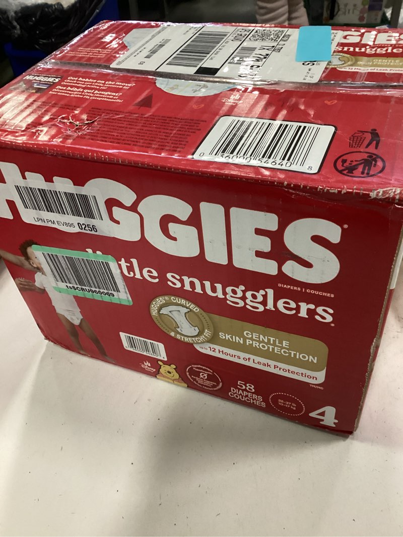 Condition photo showing New/Like New for Huggies Little Snugglers Baby Diapers  Size 4  58 Ct 