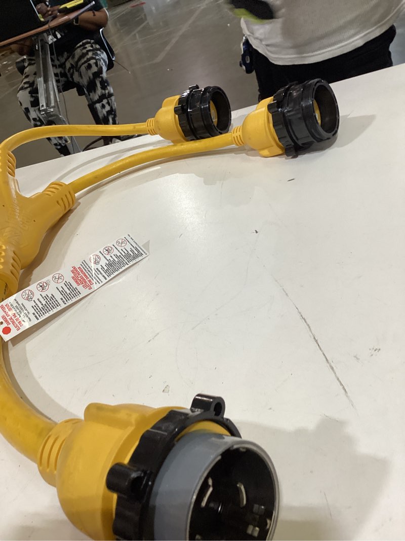 Condition photo showing As Is for power grip locking y-adapter
