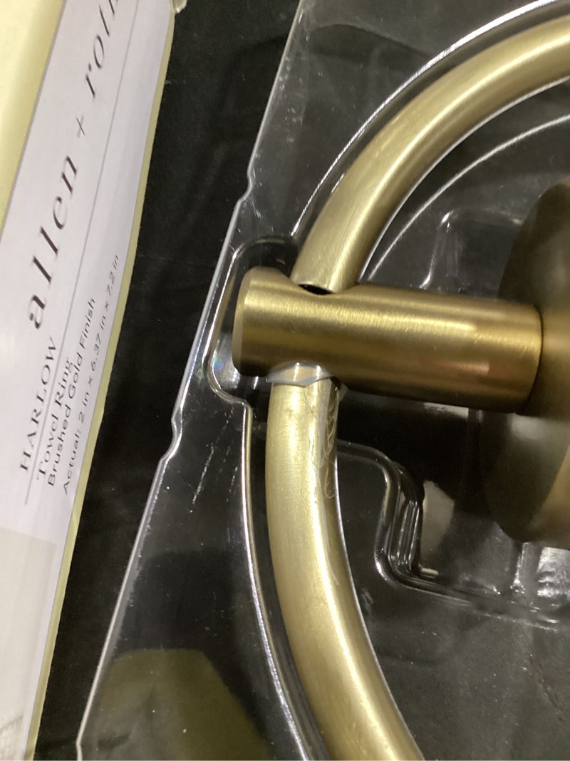 Condition photo showing As Is for allen + roth harlow brushed gold wall mount single towel ring