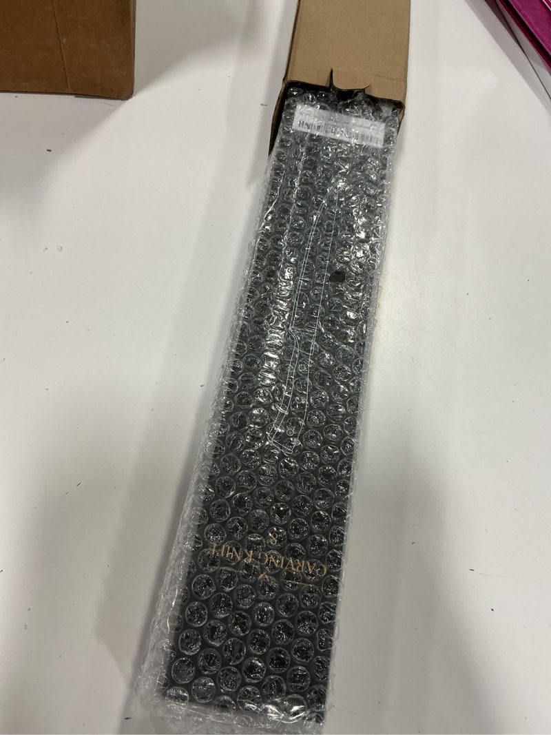 Condition photo showing New/Like New for 8" Carving Knife for Meat – Butcher Knife, Razor Sharp German Steel Slicing Knife with Ergonomic Handle for Turkey, Ham, Fruits, and Meat Cutting