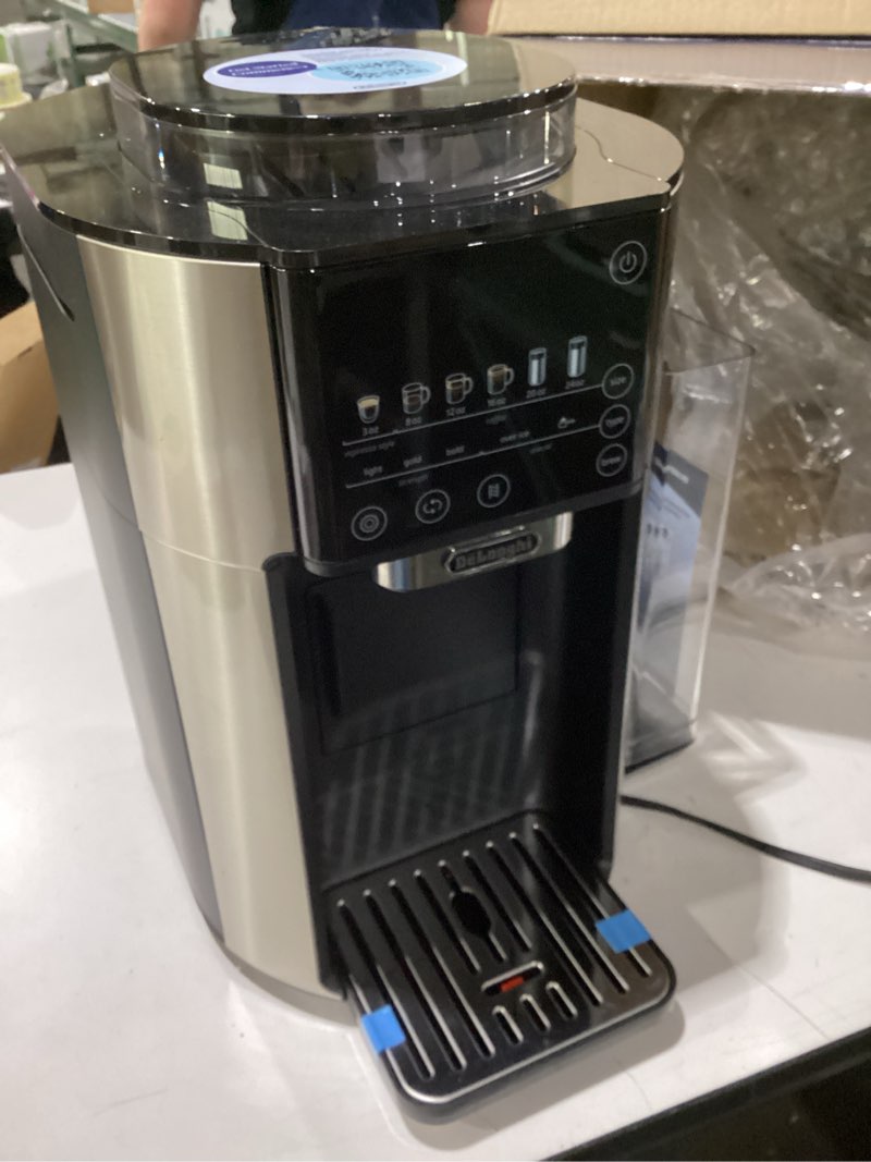 Condition photo showing As Is for used de'longhi true brew drip coffee maker, built in grinder, single serve, 8 oz to 24 oz, hot or iced coffee, stainless, cam51025mb