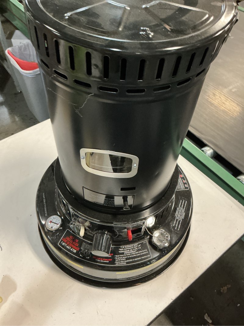 Condition photo showing As Is for Dyna-Glo 23,800 BTU Indoor Kerosene Convection Heater