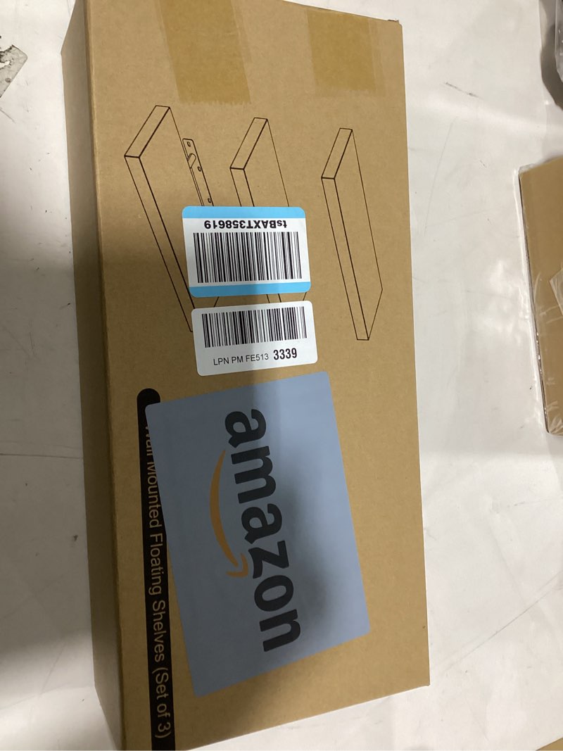 Condition photo showing New/Like New for BAYKA White Floating Shelves for Wall – Rustic Wood Wall Shelves with Metal Brackets for Bathroom, Bedroom, Kitchen, or Living Room Decor Organization – Set of 3, Sturdy Storage with 22lb Capacity C. White - Modern Minimalist Style 15.7inches