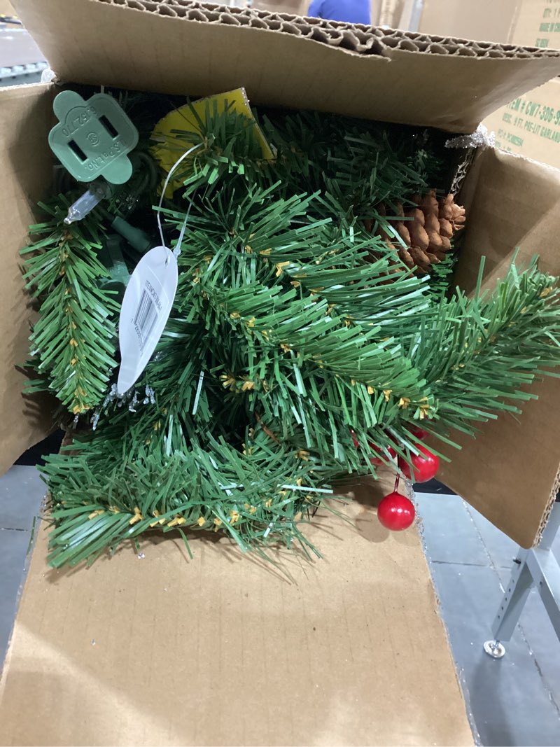 Condition photo showing Good Condition for national tree company 9 ft pre-lit crestwood spruce artificial christmas garland, christmas decoration with glitter, pinecones, red berries, 50 clear lights, 180 tips, green plug in tree