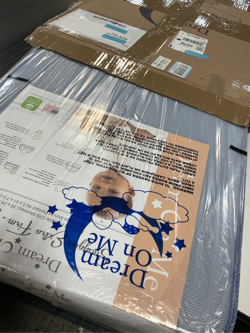 Condition photo showing New/Like New for Dream On Me Snuggles Extra Firm Baby Crib Mattress – Water-Resistant Periwinkle Vinyl Cover, GREENGUARD Gold & JPMA Certified, Fits Portable & Mini Cribs, Made in USA, 10-Year Warranty