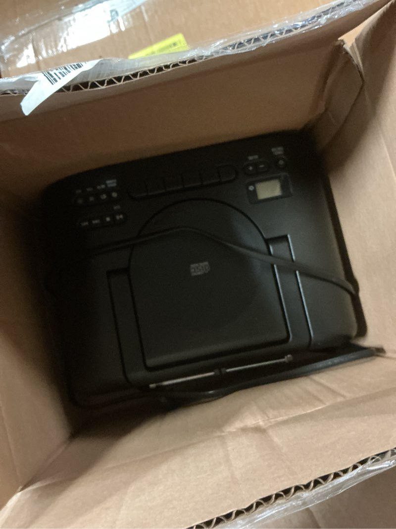 Condition photo showing As Is for onn. portable bluetooth cd/cassette boombox with wireless technology, black