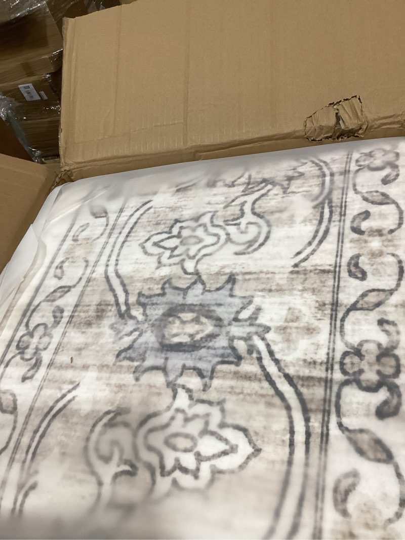 Condition photo showing New/Like New for washable 9x12 area rug for living room - ultra soft vintage carpet with non-slip backing, stain resistant low-pile indoor rug for bedroom & home office, kid & pet friendly - beige beige 9' x 12' (rectangular)